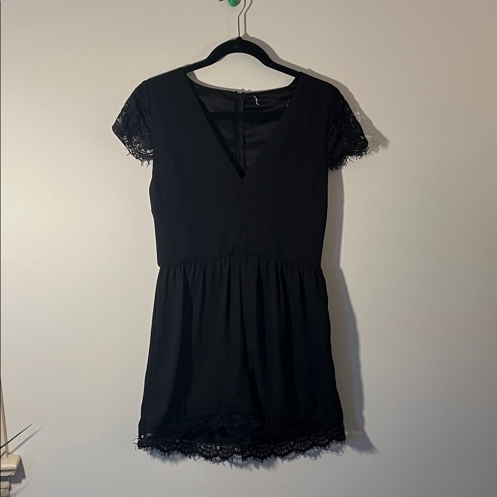 Stylish Black Romper with Lace Accents